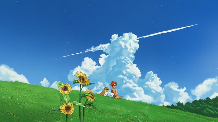 Ed and Ein on a grassy hill with sunflowers