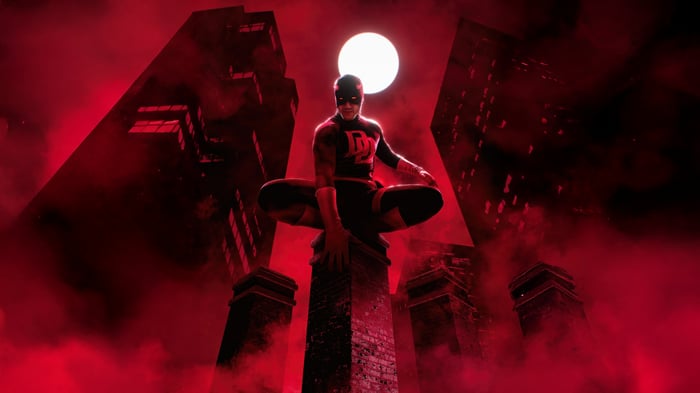 Daredevil Crouching on a Building Ledge
