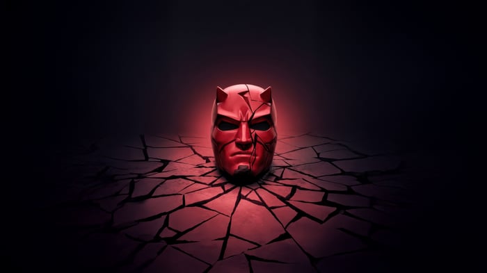 Daredevil Mask Shattered on Cracked Ground