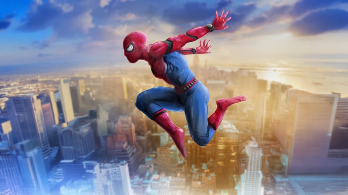 Spider-Man leaping over a city skyline
