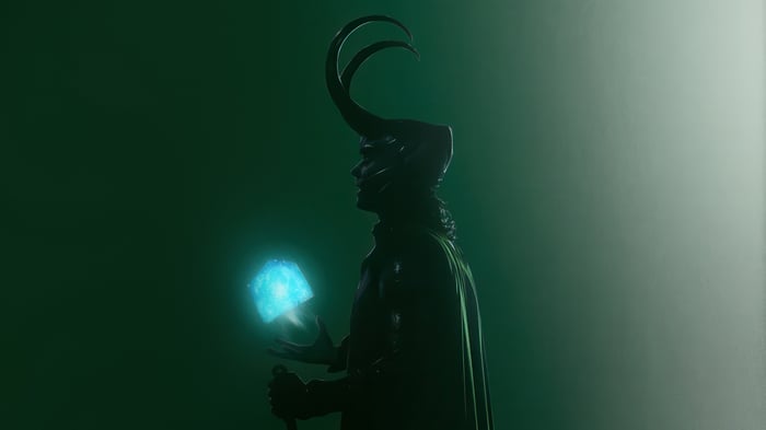 Loki holding the Tesseract