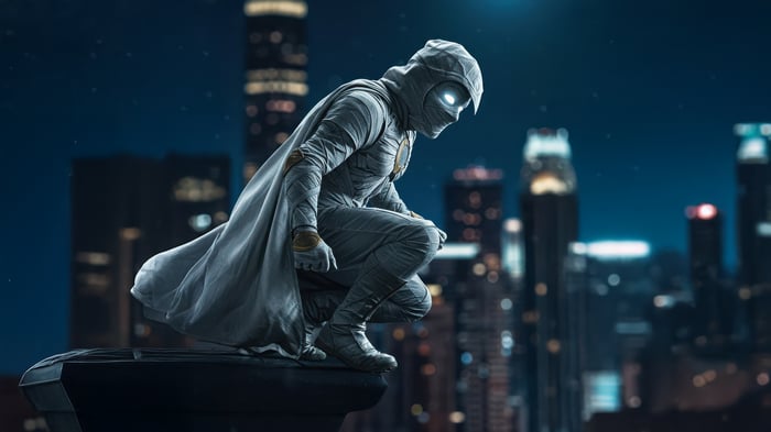 Moon Knight Crouching on a Rooftop at Night