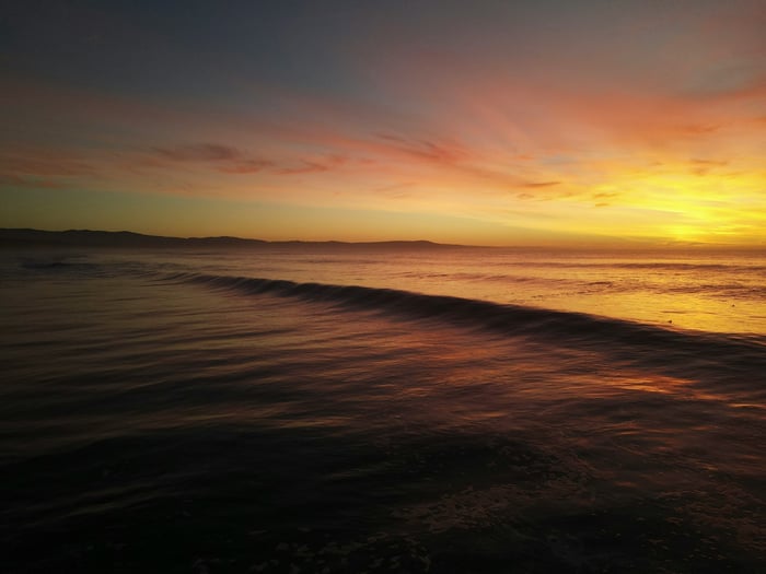 Sunset over the ocean at Marina State Beach, California