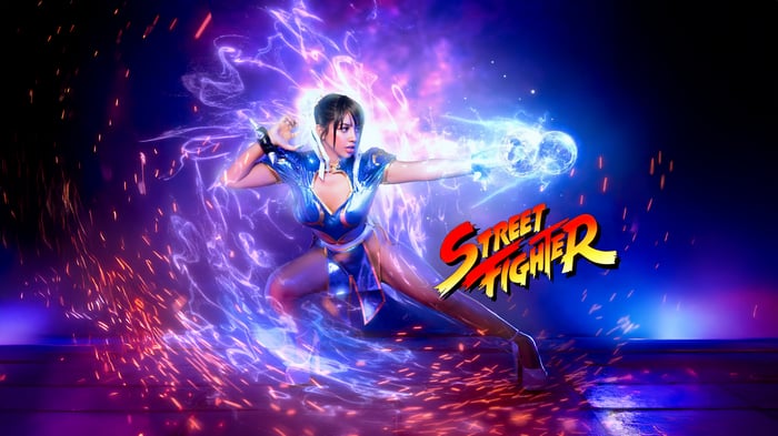 Chun-Li from Street Fighter with energy blasts