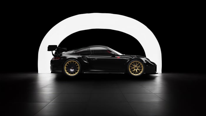 Black Porsche 911 GT3 RS with gold wheels