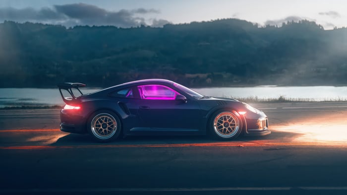 Porsche GT3 RS with purple interior on a road