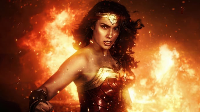 Wonder Woman in a fiery background