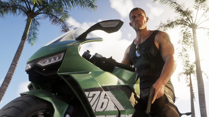 Jason Duval on a motorcycle with a gun