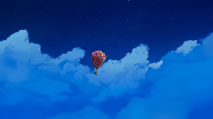 Up hot air balloon flying in the night sky