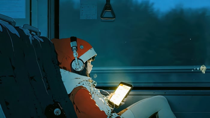 Girl with Santa hat on a train at night