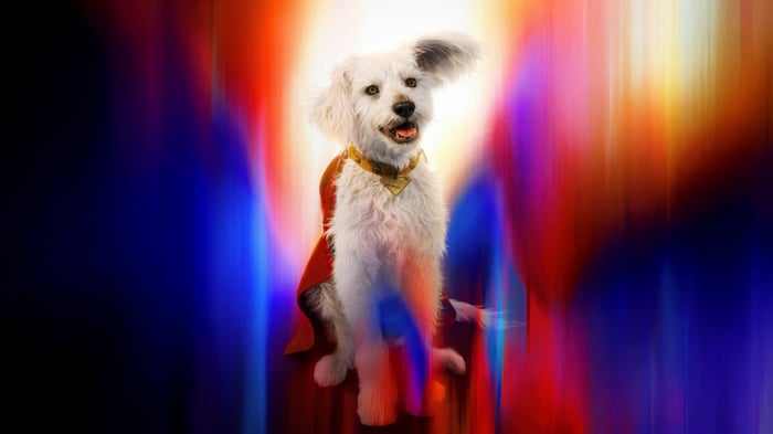 Krypto the Superdog in a red cape and gold collar