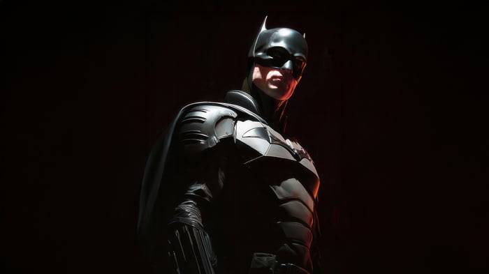 Batman in a dark, dramatic pose
