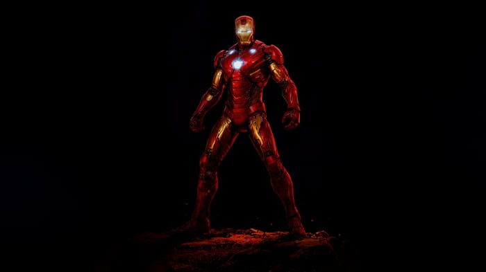 Iron Man standing on a rocky surface