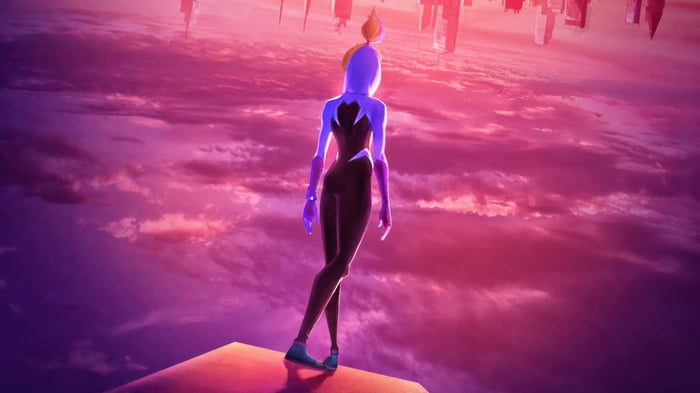 Gwen Stacy standing on a platform overlooking a city
