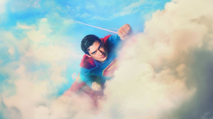 Superman flying through clouds