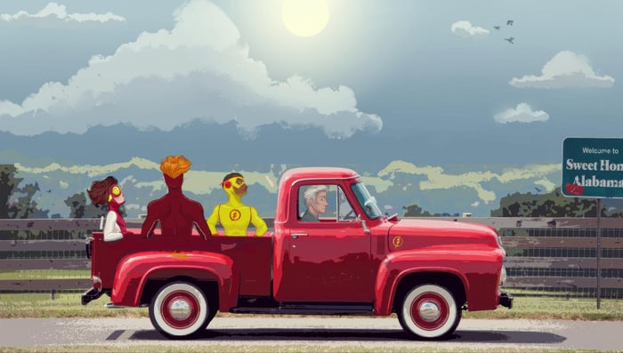 The Flash Family in a red pickup truck