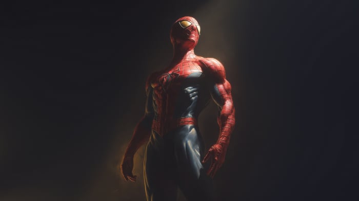 Spiderman standing in dramatic lighting