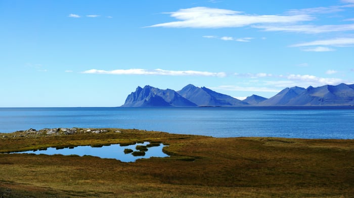Blue Horizons and Mountains Over the Sea