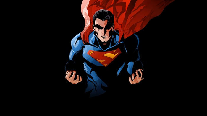 Superman flying with red cape