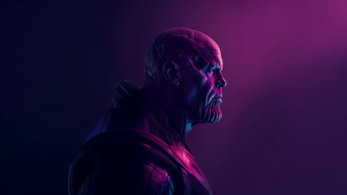 Thanos in profile with purple and blue lighting