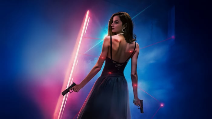 Ana De Armas in a Black Dress with Guns
