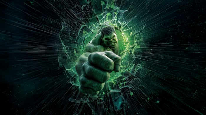 The Hulk smashes through a cracked green surface