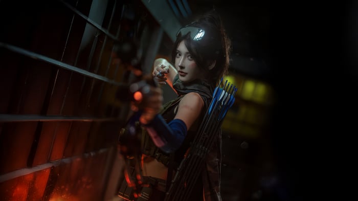 Delta Force Game Cosplayer with Bow and Arrows