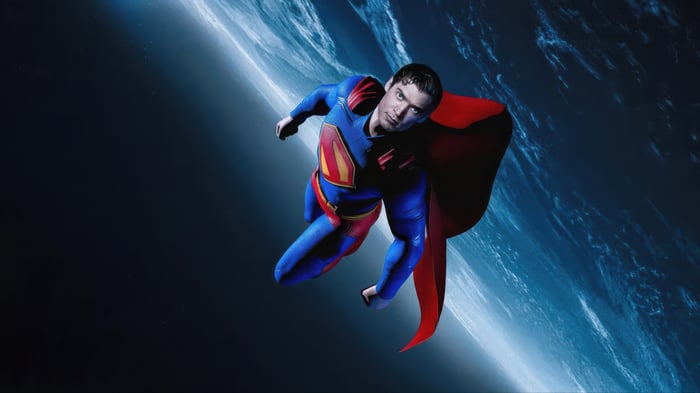 Superman flying in space with Earth below