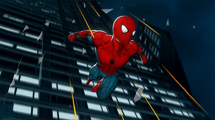 Spectacular Spider-Man swinging past a skyscraper