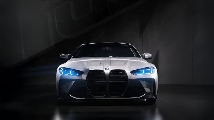 White BMW M4 with Blue Headlights