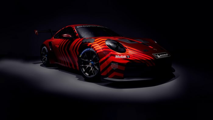 Red Porsche 911 Cup car with racing decals