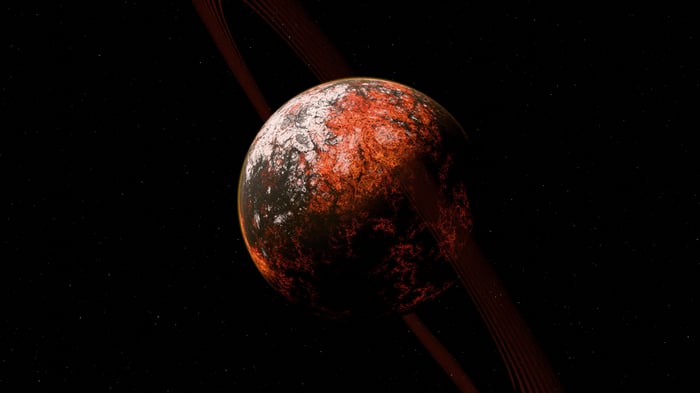 A ringed planet with a fiery surface in space