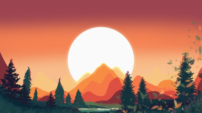 Sunset over mountains with trees and sunlight