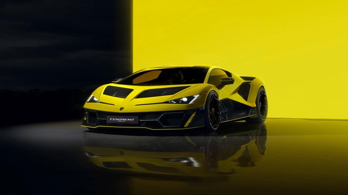 Yellow Lamborghini Fenomeno on a reflective surface