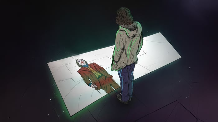 Joker reflected in a broken mirror