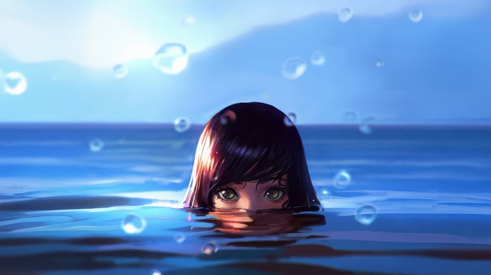 Girl partially submerged in water with bubbles