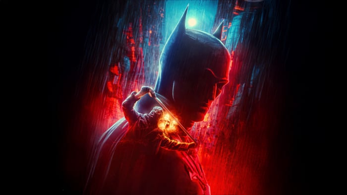 The Batman and Riddler in the rain