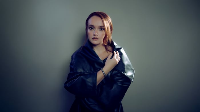 Olivia Cooke in a black leather jacket