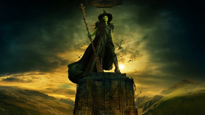 Elphaba from Wicked on a stone tower