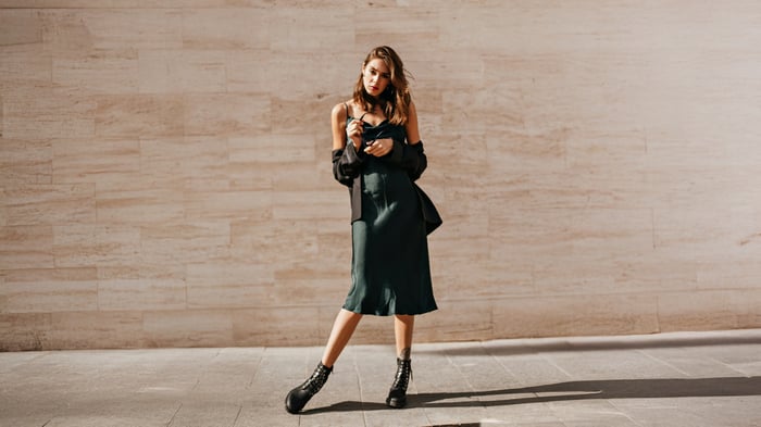 Woman in a black dress and jacket