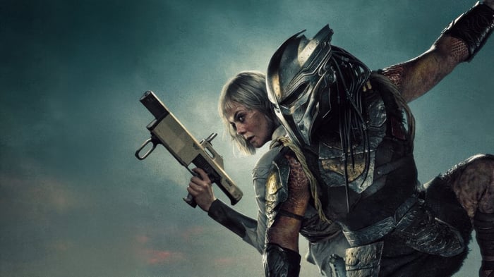 Predator and woman with gun