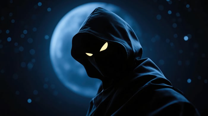Mysterious Hooded Man with Glowing Eyes Under Blue Moon