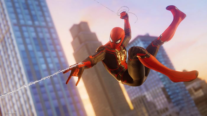 Spider-Man swinging through a city