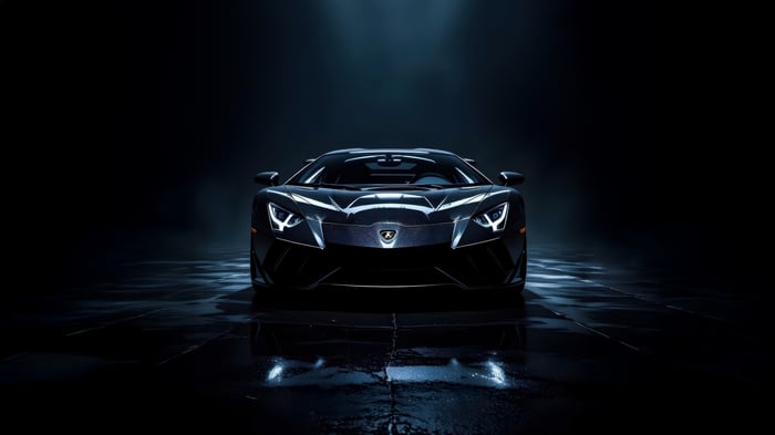 Black Lamborghini Aventador parked on wet ground
