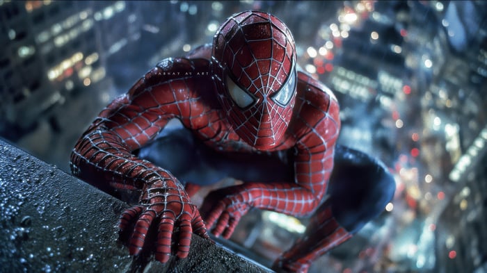 Spider-Man Crouching on a Building Ledge