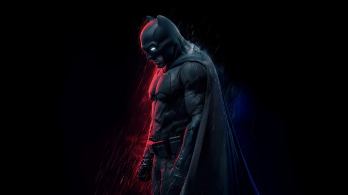 Batman in Dark Suit with Red and Blue Lighting