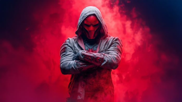Red Hood with Arms Crossed in Red Smoke