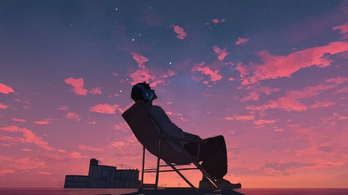 Anime boy with headphones sitting at sunset