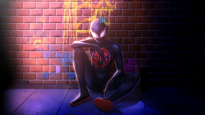 Miles Morales sitting in front of a graffiti wall