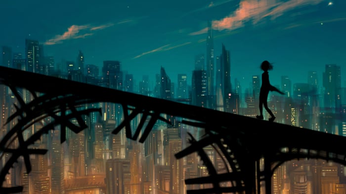 Silhouette of a person walking on a bridge overlooking a city at night